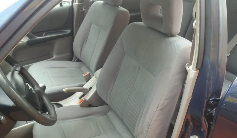 Mazda 323F cheio