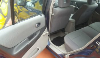 Mazda 323F cheio