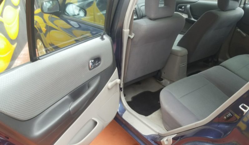 Mazda 323F cheio