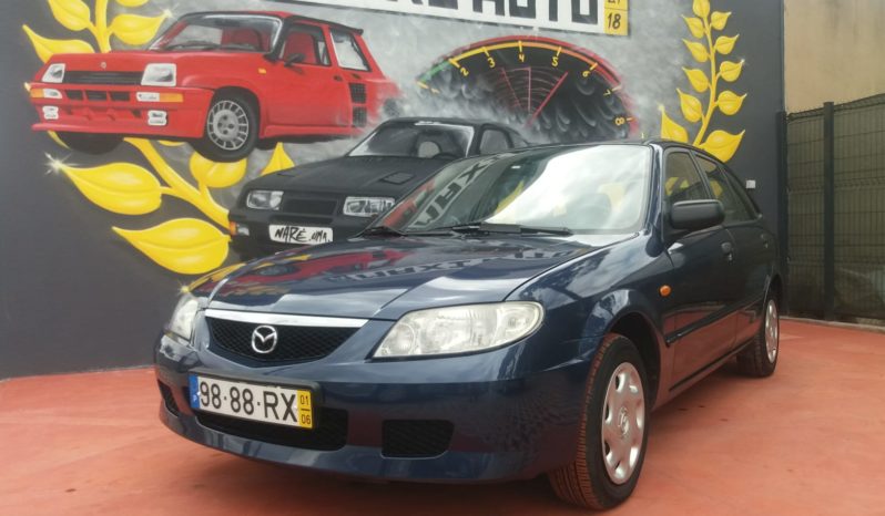 Mazda 323F cheio