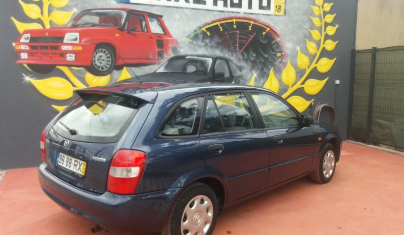 Mazda 323F cheio