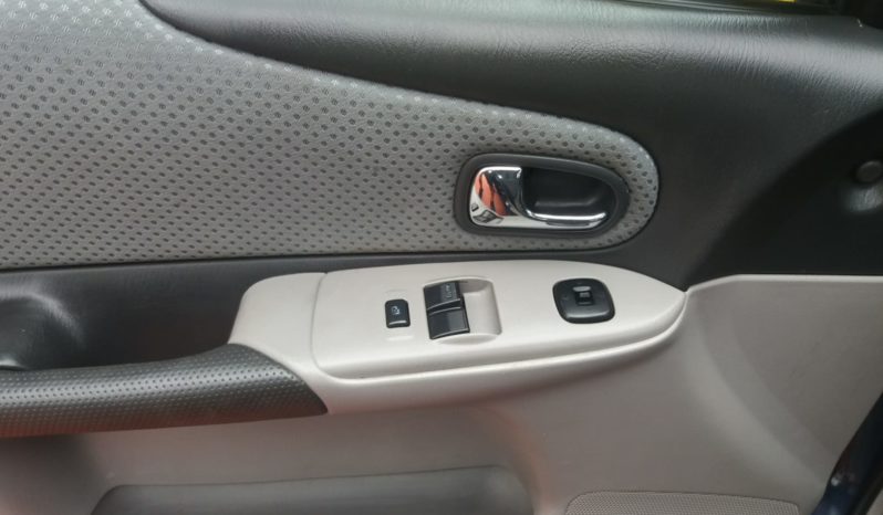 Mazda 323F cheio