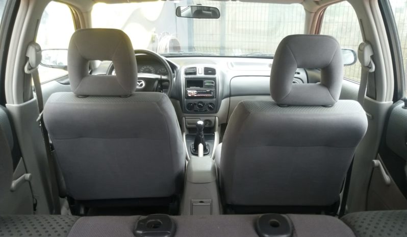 Mazda 323F cheio